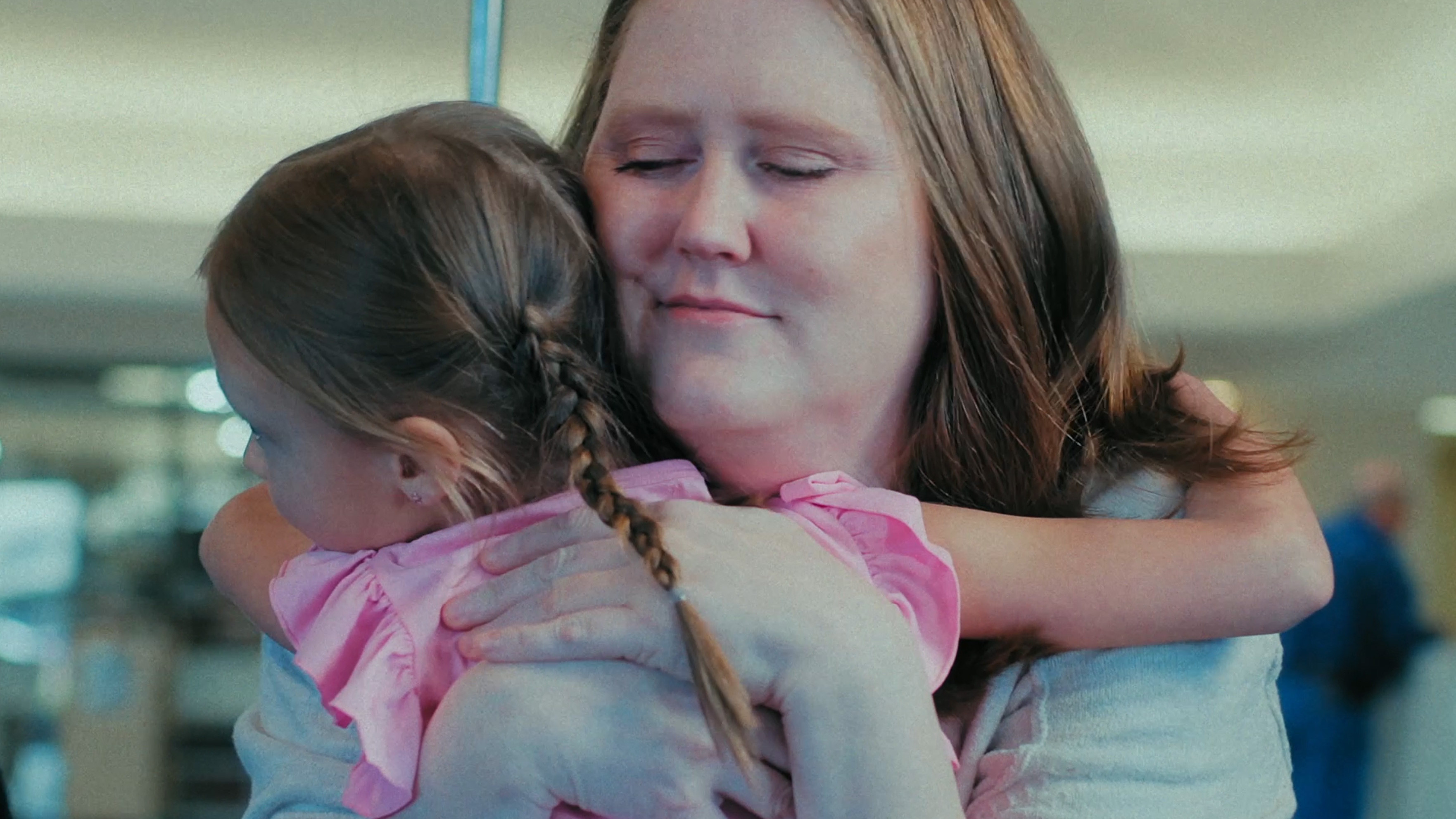 Woman and child hugging